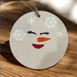 Handmade Festive Wooden Snowman Ornament with Orange and Red Accents